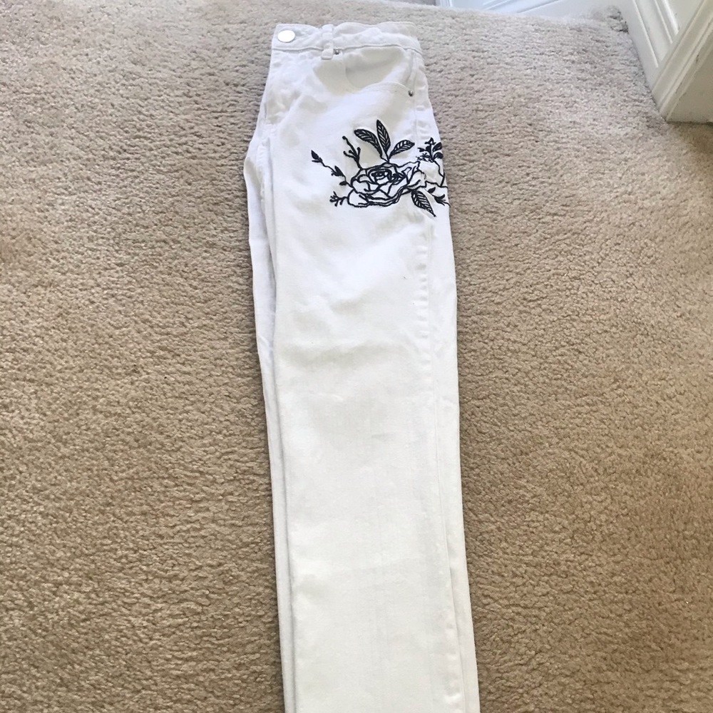 White embroidered jeans